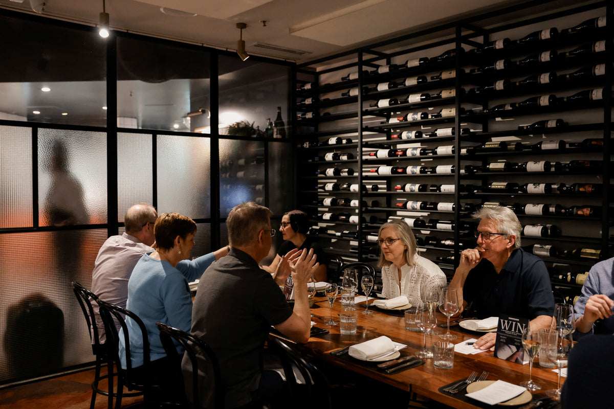 Mount Langi Ghiran wine club event wit hmembers enjoying conversations at a table in Palermo Restaurant Melbourne